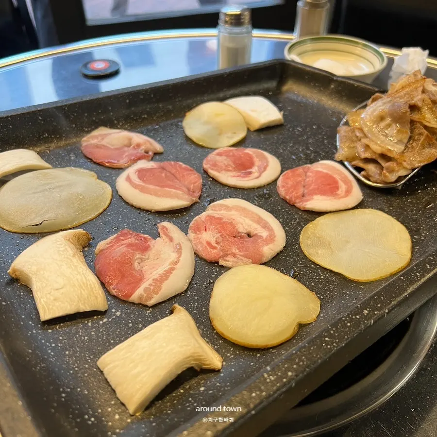 Pork cheek meat grilling on the pan