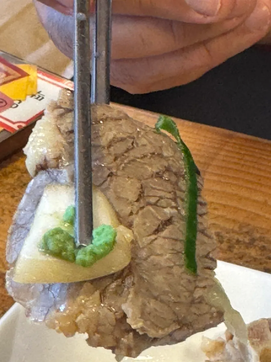 Oxtail gomtang meat with onion sauce and wasabi