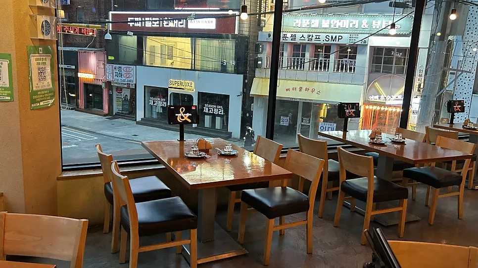 Interior view of Rama & Babana with full-height windows