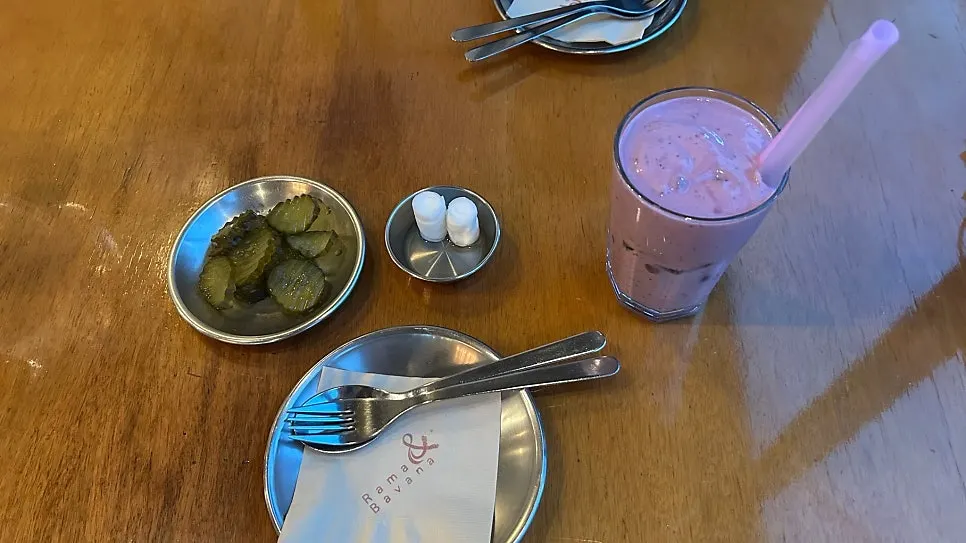 Beef curry, naan, chicken, chapati, and blueberry lassi
