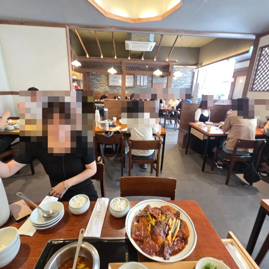Interior of Pyeongsang Myeonok's dining room full of customers
