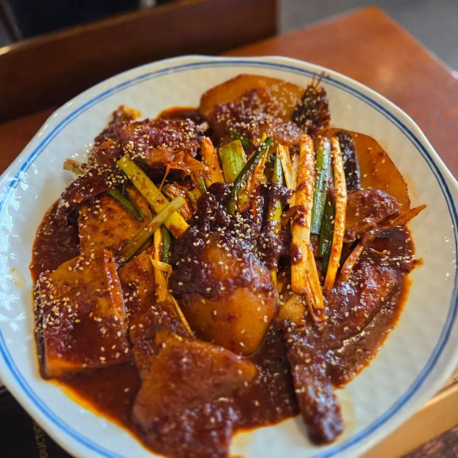 Full spread of steamed Daegu cod head dishes