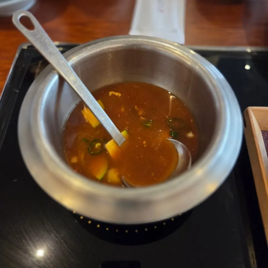 Doenjang (soybean paste) served alongside the steamed Daegu cod head