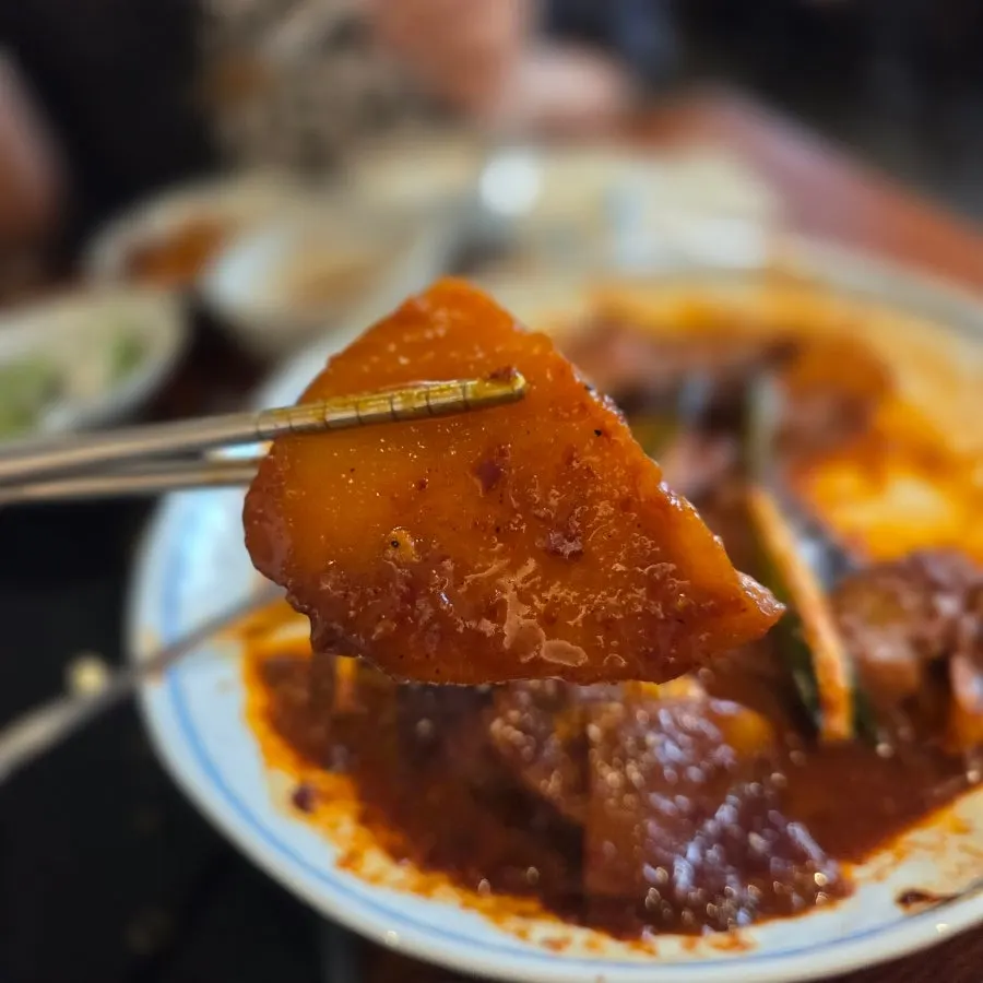 Radish and potato pieces braised in the sauce