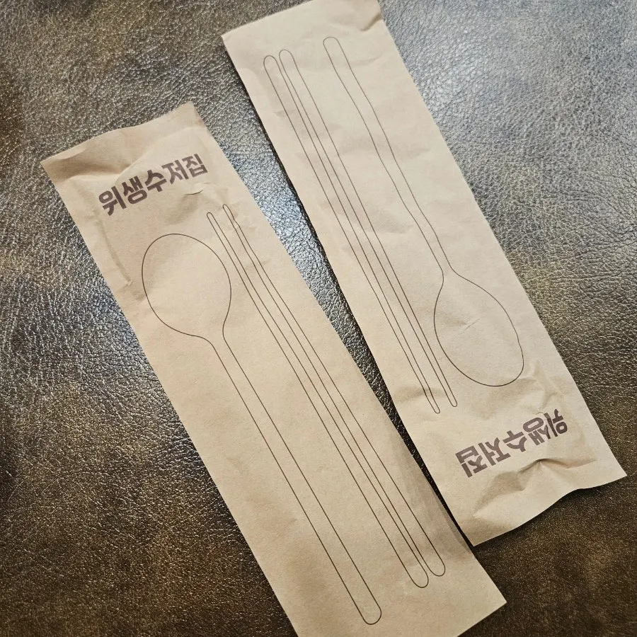 Aprons and hair ties provided on the table