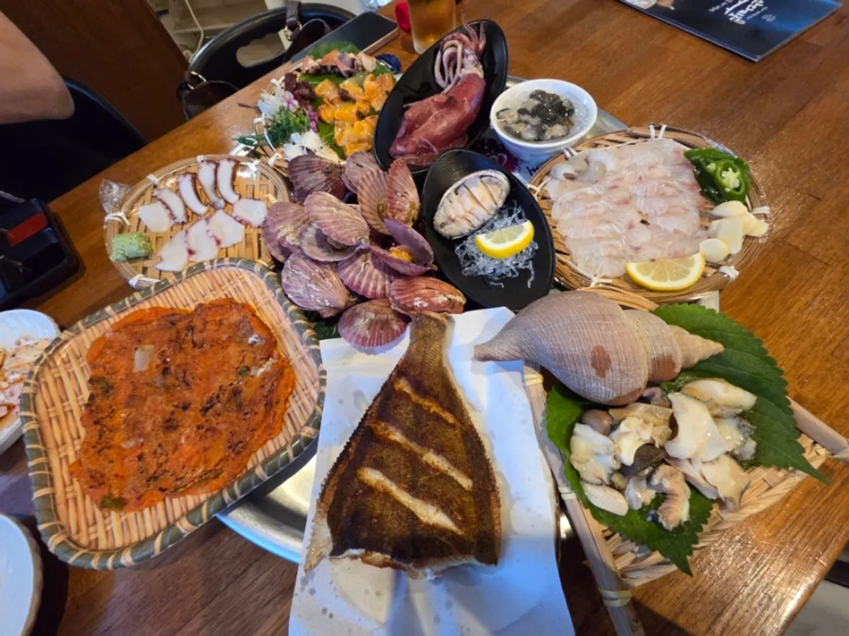 Assorted seafood set spread across a small table