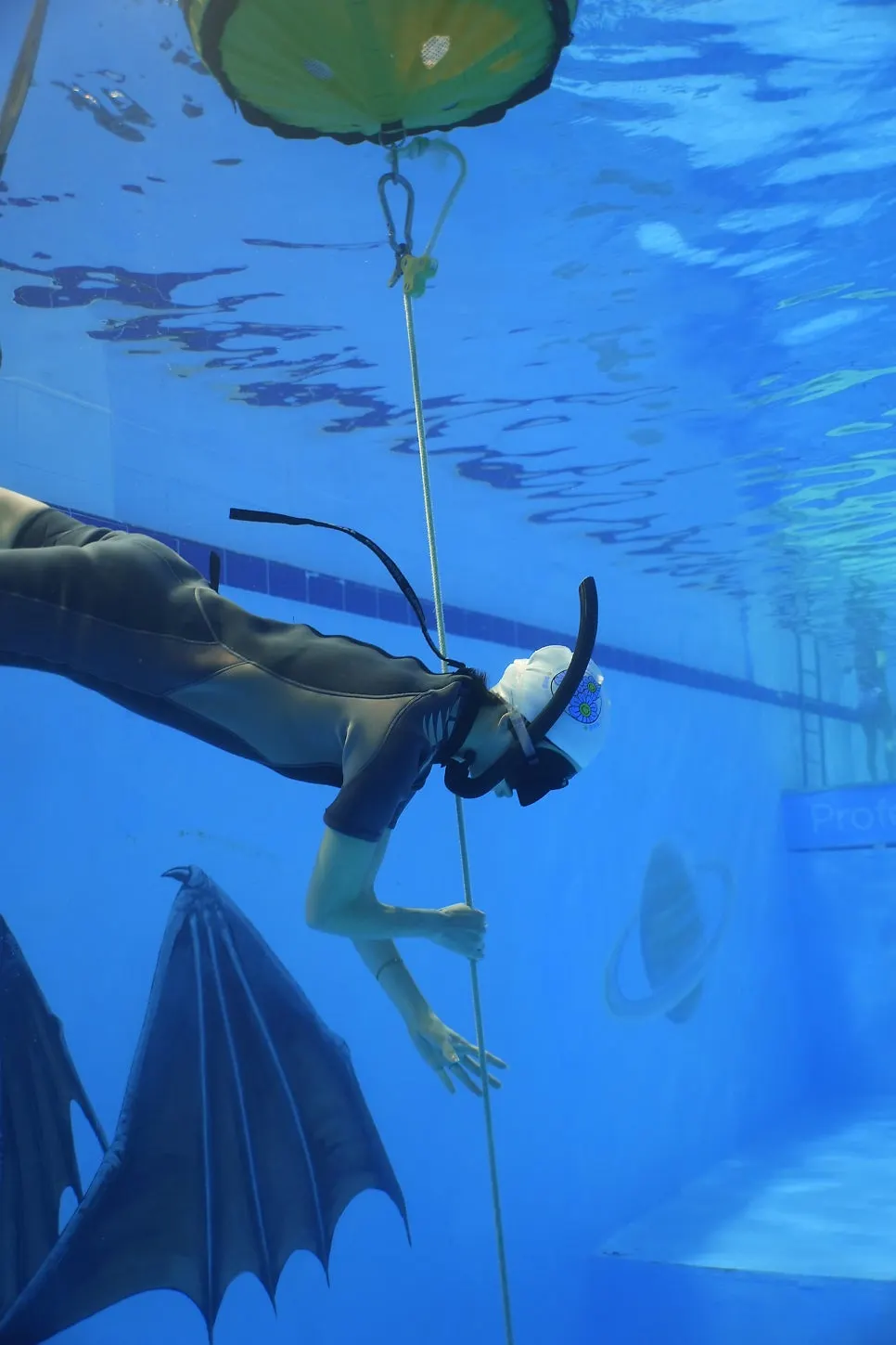 Equalizing practice descending seated while holding the line