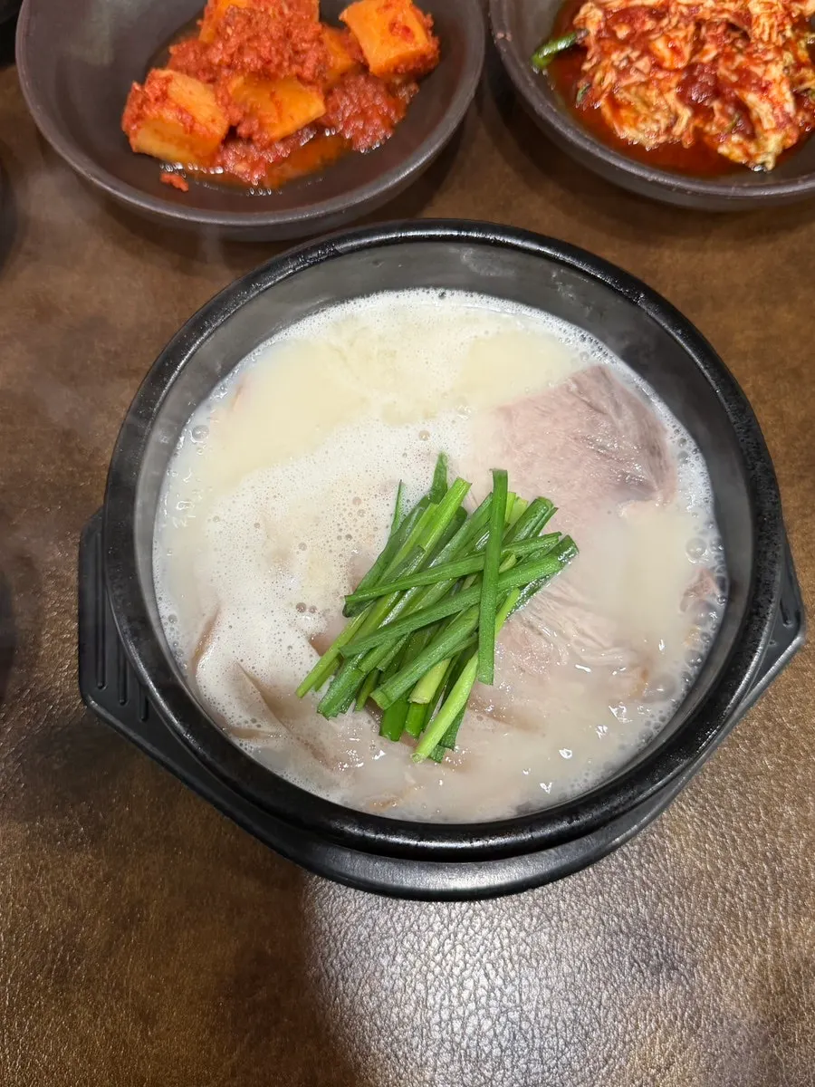 Close-up of the large piece of meat on the pork gukbap