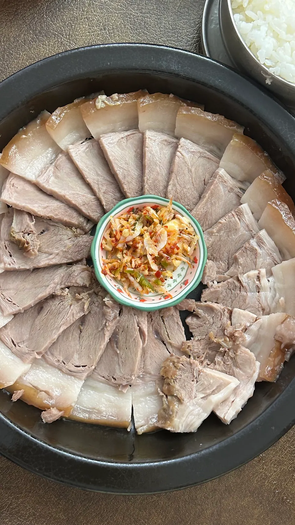 The boiled pork set with a plate of pork and bone broth