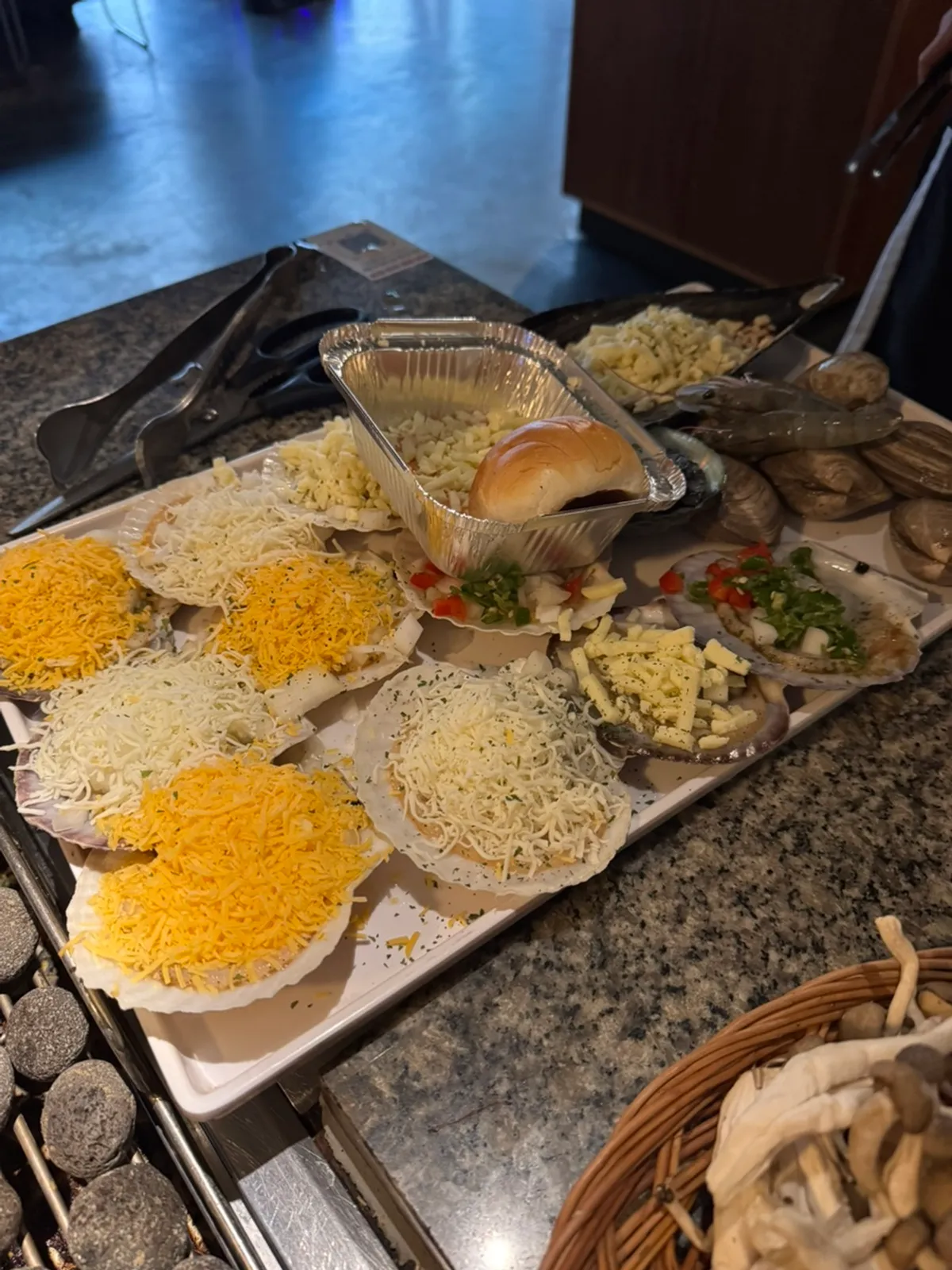 Set de conchas a la parrilla con queso para 2-3 personas