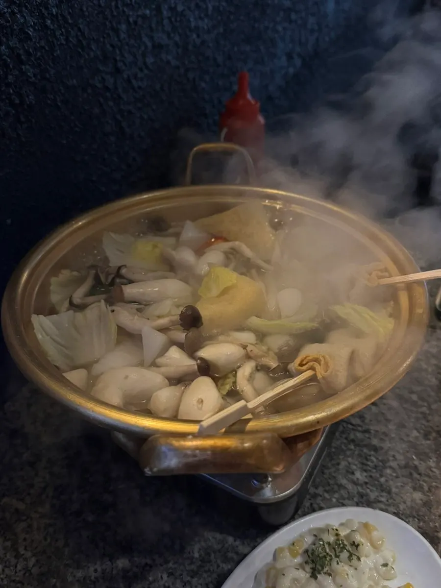 Parrilla de conchas preparada por el personal