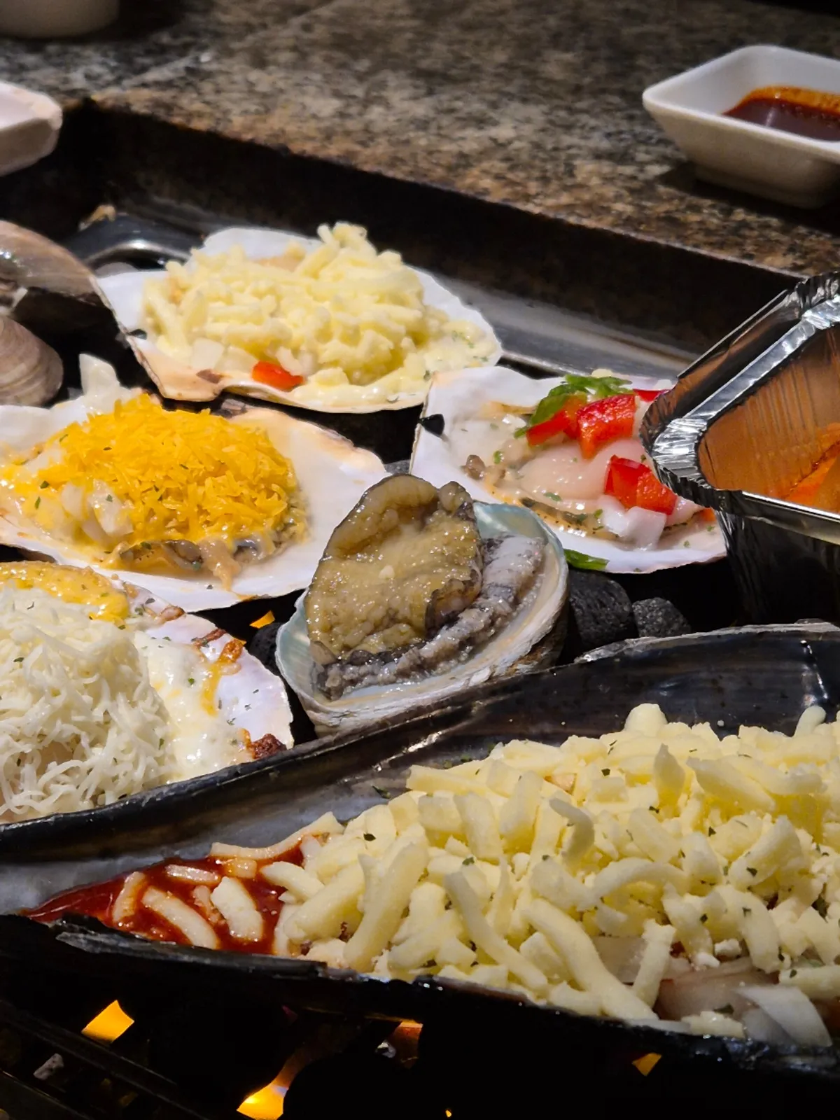 Nampo's signature grilled shellfish dish in Gyodong, Daegu