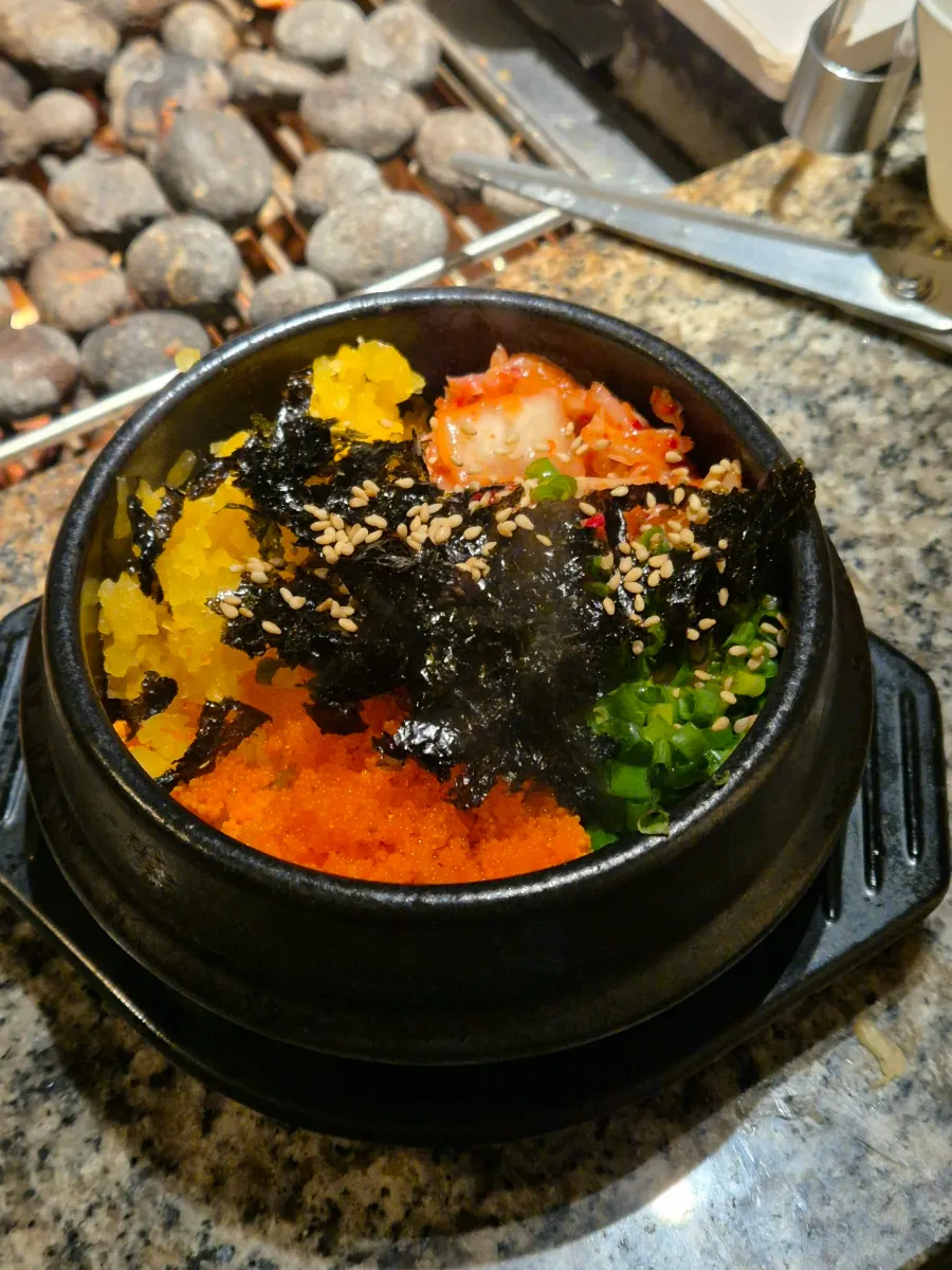 Nampo's hot pot fish roe rice sizzling in the pot