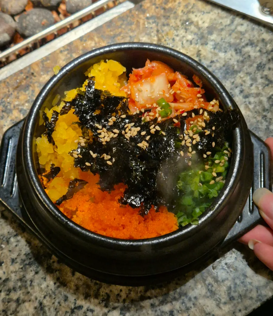 Close-up of the hot pot fish roe rice topped with flying fish roe