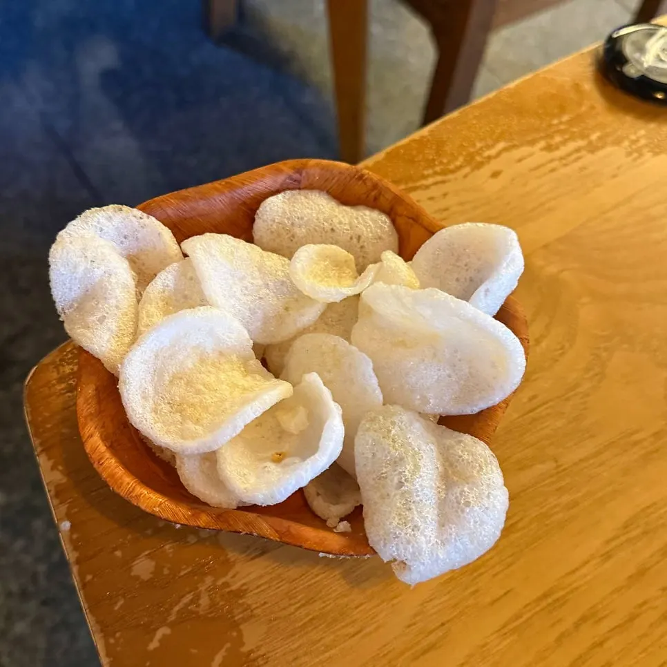Tiny shrimp crackers served before the food
