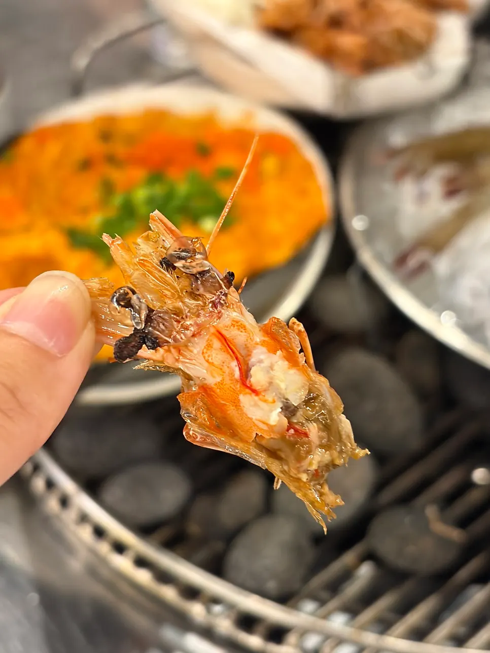 Crispy grilled shrimp heads as a side dish