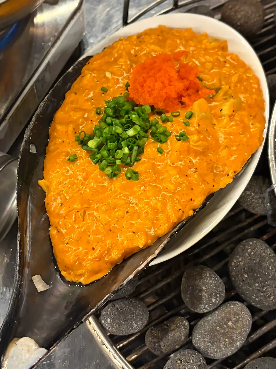 Close-up of risotto topped with scallop