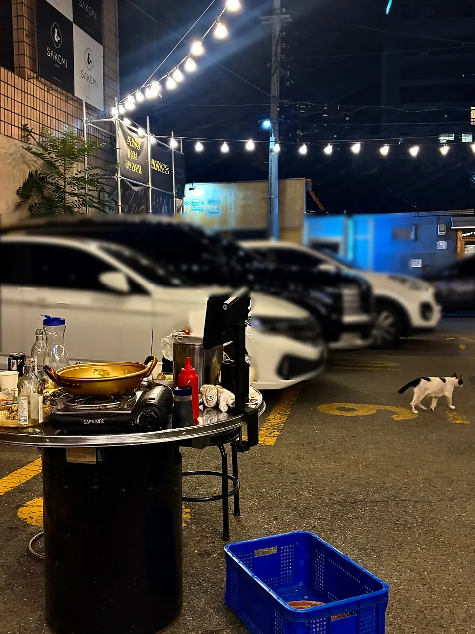 Outdoor patio seating lit up after dark