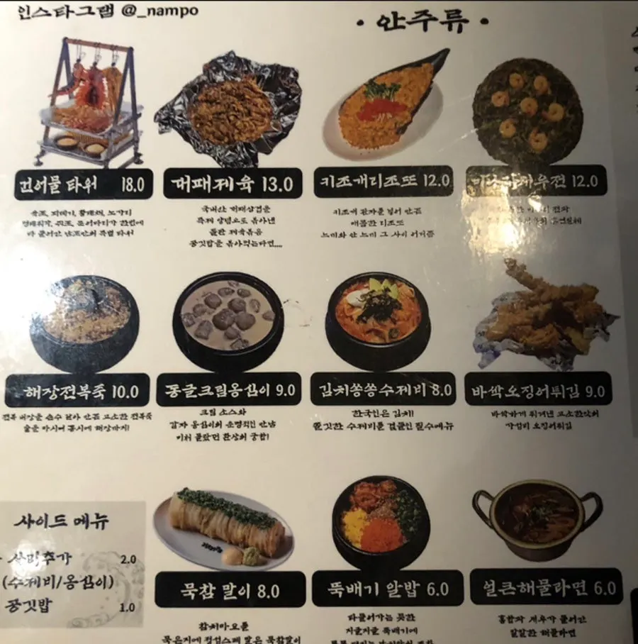 Table with raw shrimp and accompanying sauces