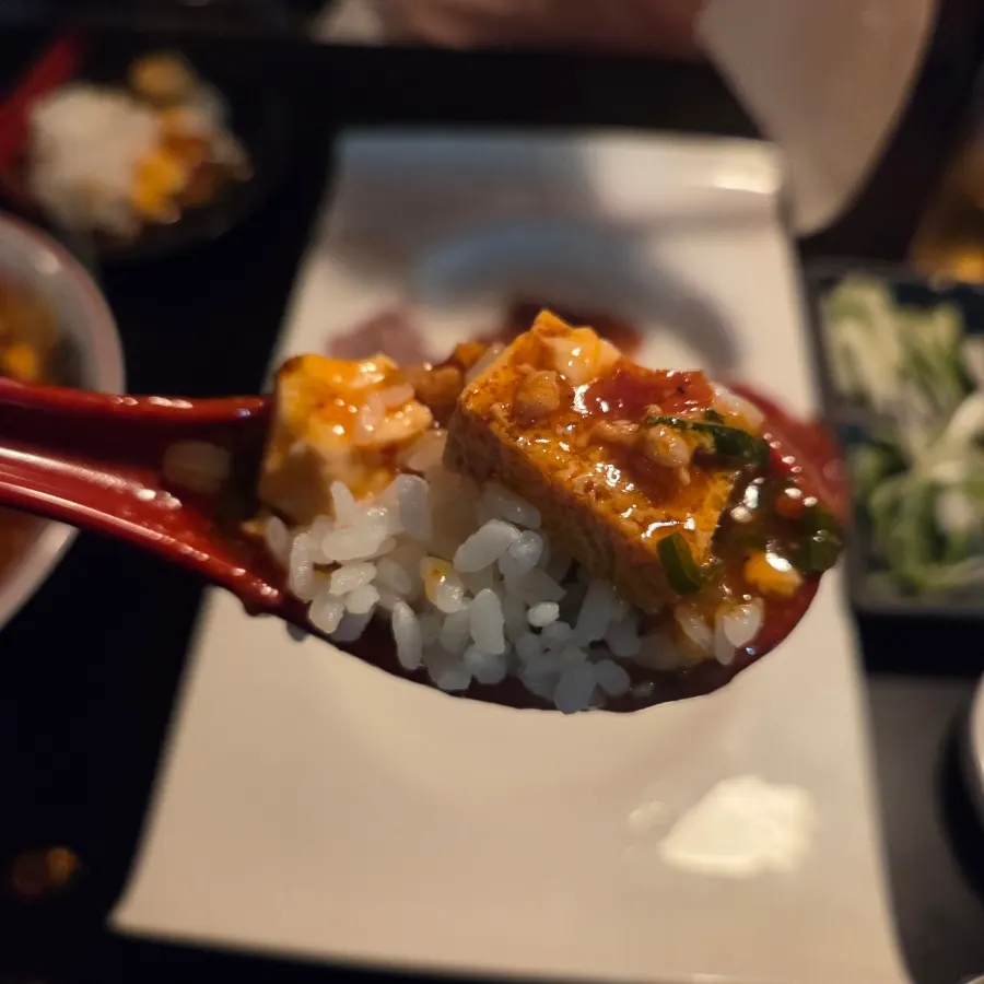 Rice mixed into a mapo tofu rice bowl