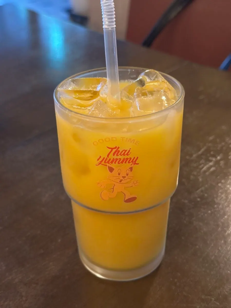 A glass of Thai Yami's fresh-squeezed orange juice