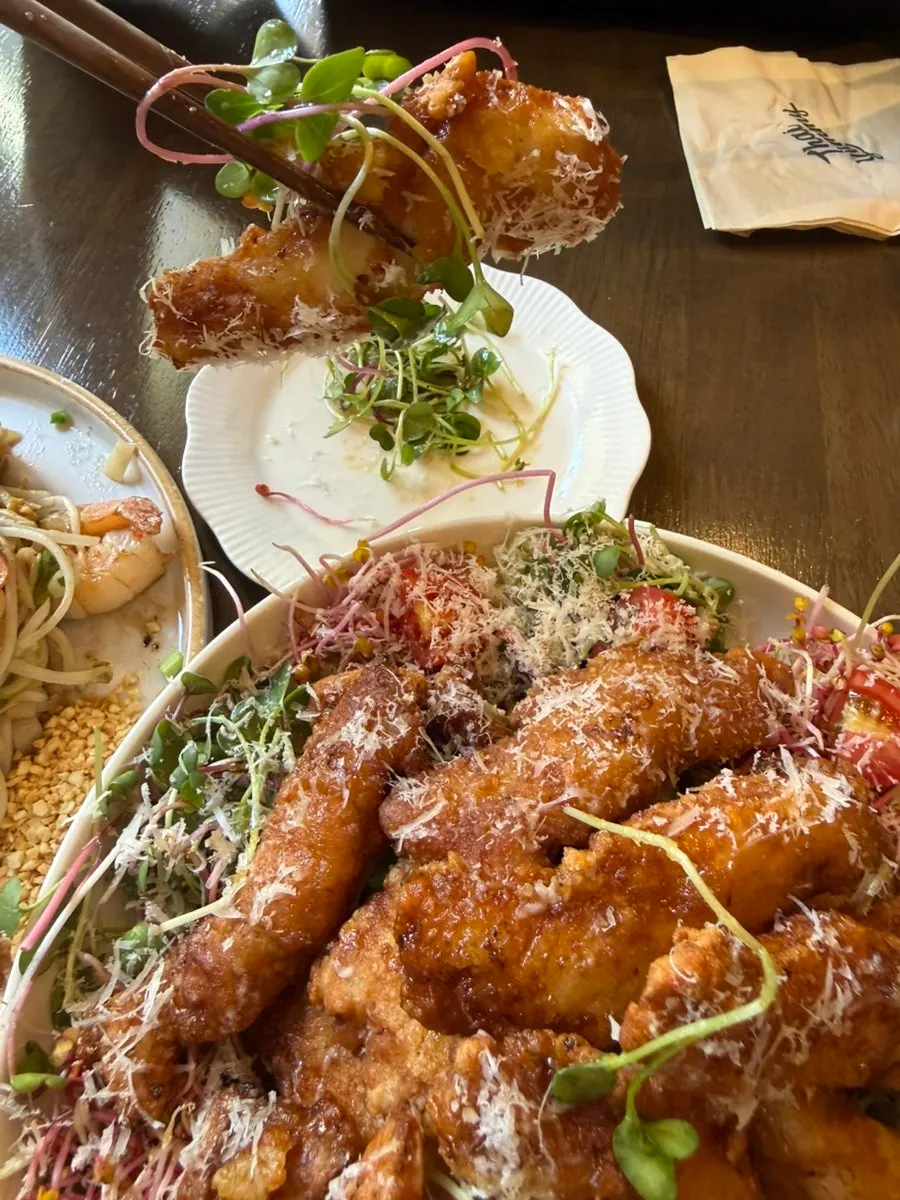 Cheese-coated fried chicken with lettuce