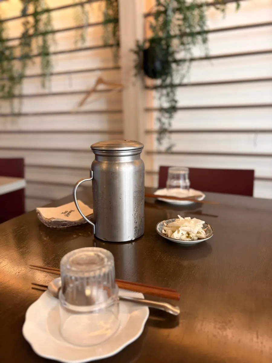 4-seat table at Thai Yami with a coat hook