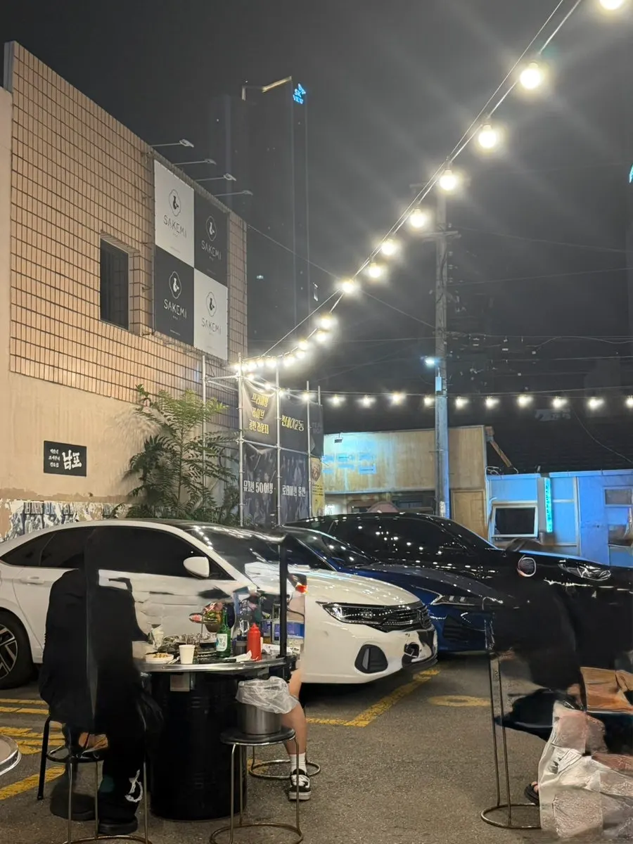 Dedicated parking space in front of Nampo's building