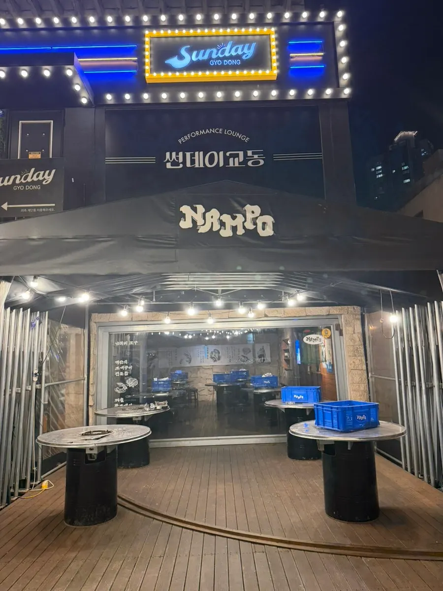 Deck seating at Nampo's entrance that connects to the outdoors