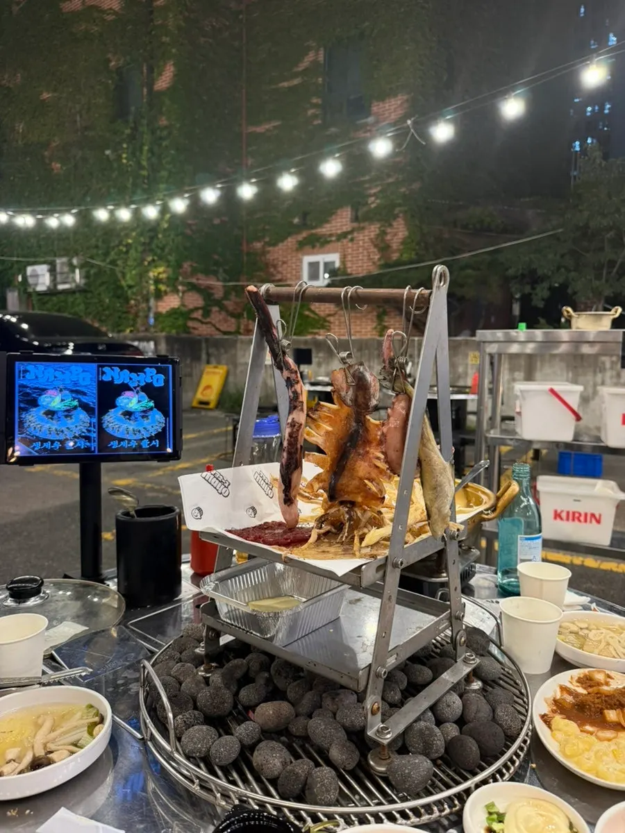 Nampo's dried-seafood tower with pieces hanging down