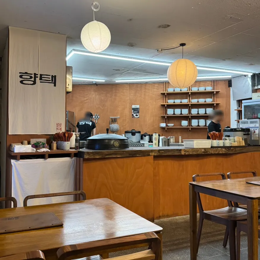 Wood-toned interior of Hyangtaek Daebong Branch
