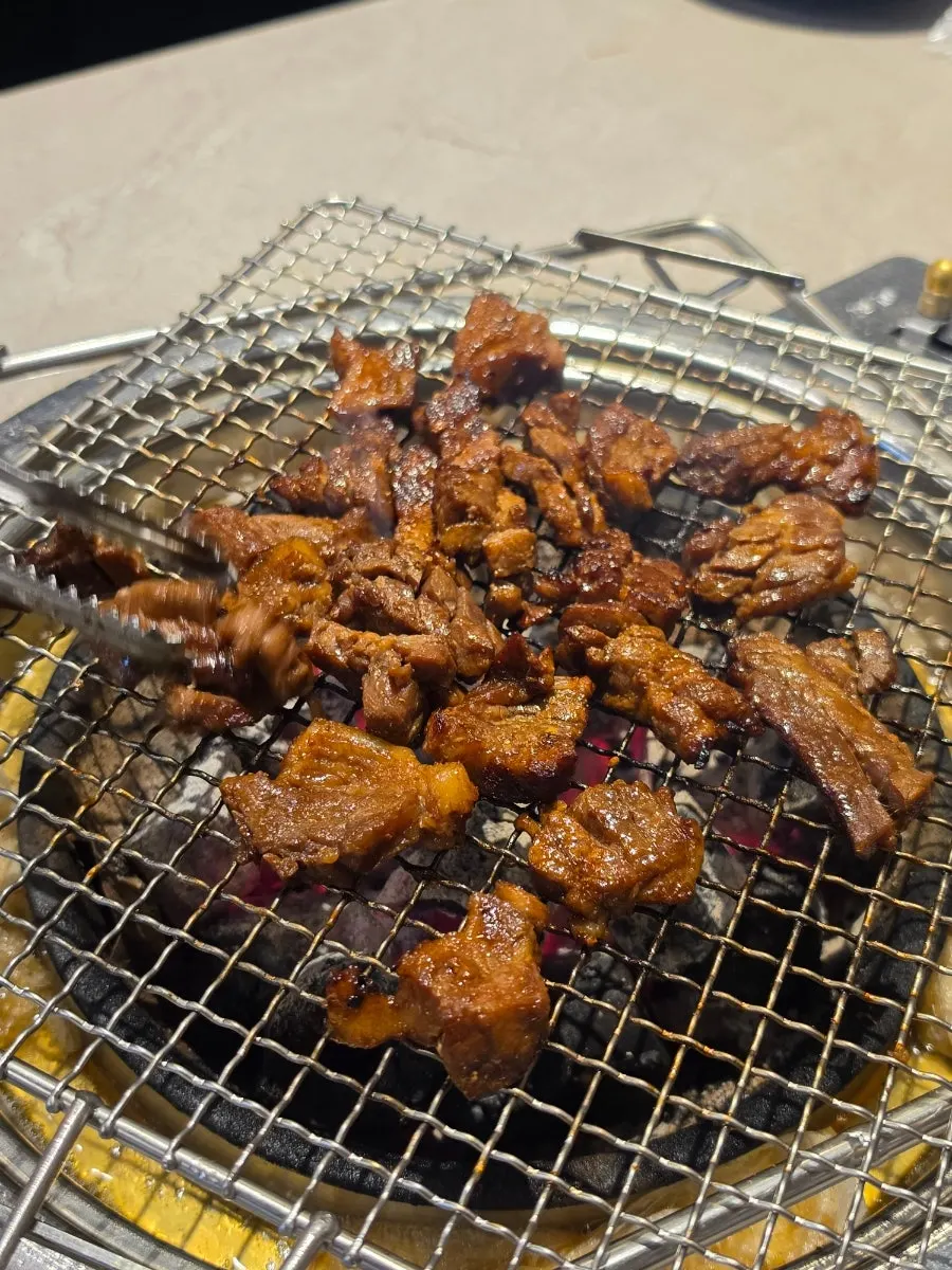 Seasoned pork ribs on the grill