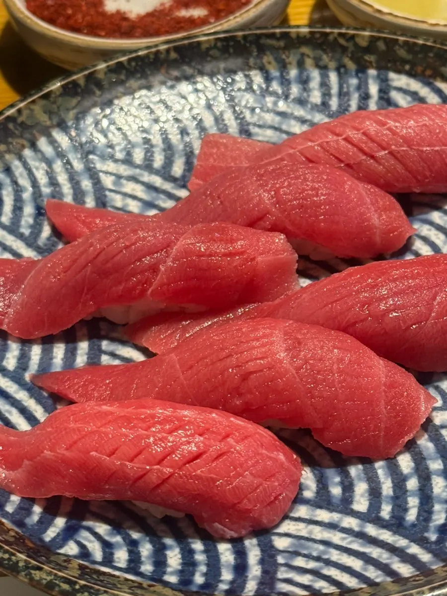 Second refill of tuna sashimi and tuna sushi