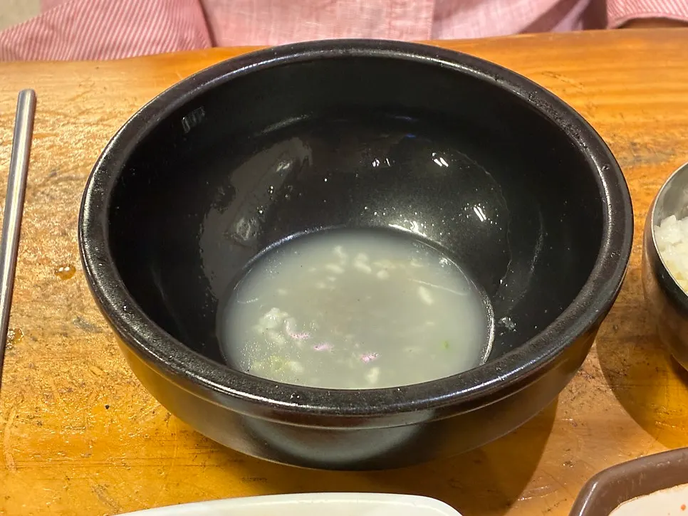 A gukbap bowl emptied down to the broth