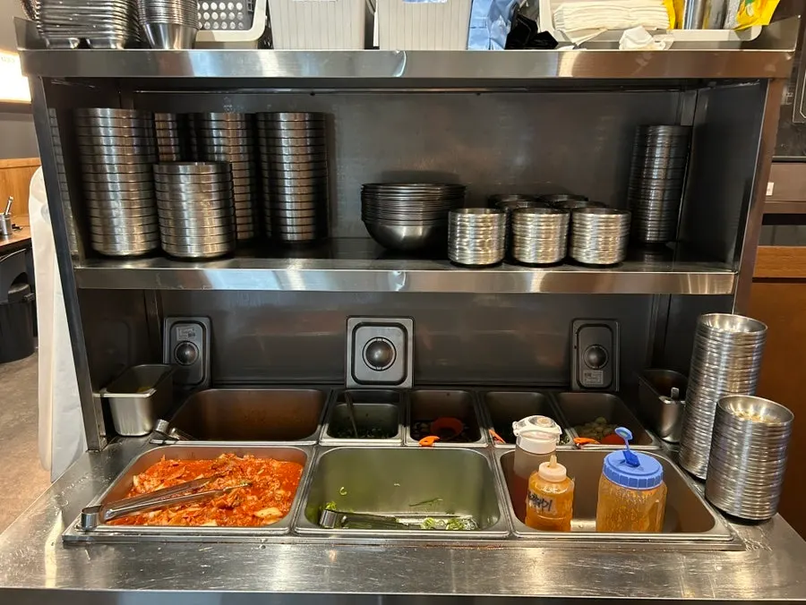 Self bar with signage for unlimited ramen and patbingsu refills