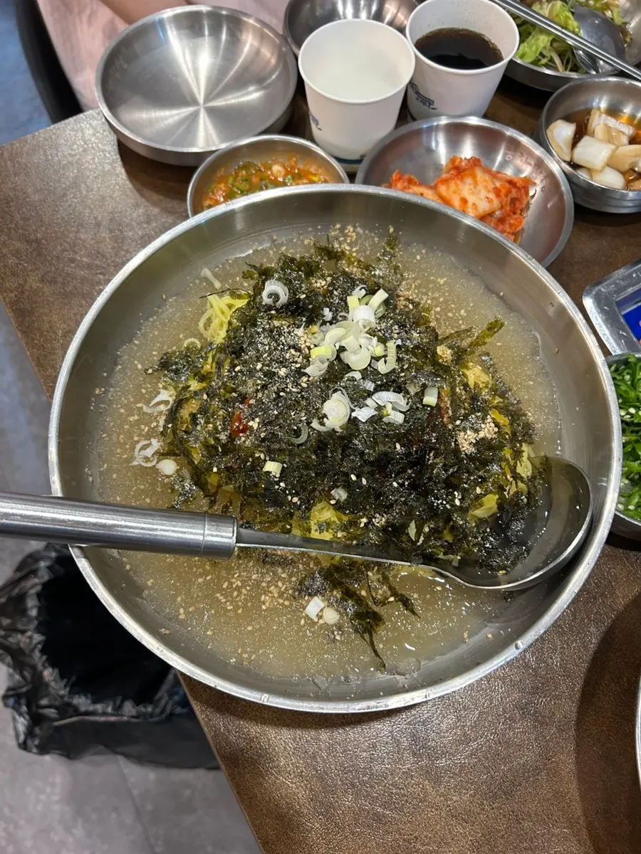 Raw makchang from Bongja Makchang eaten wrapped in lettuce
