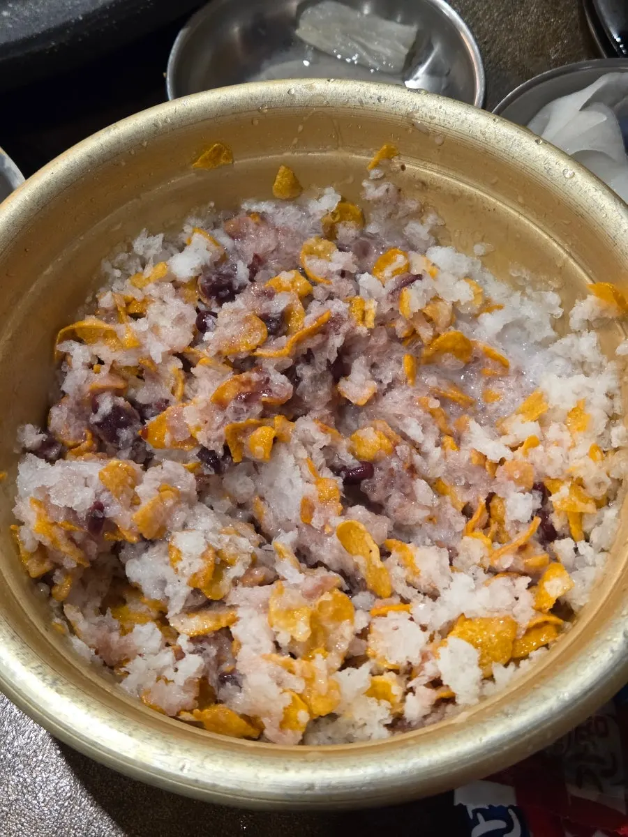 Eating Bongja Makchang's doenjang jjigae with rice