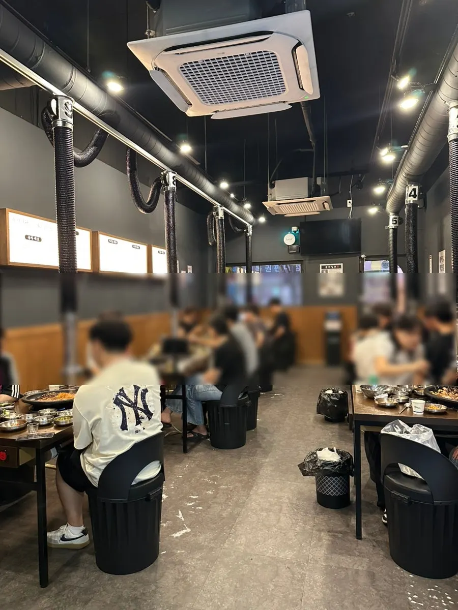 The bustling dining hall at Bongja Makchang late at night