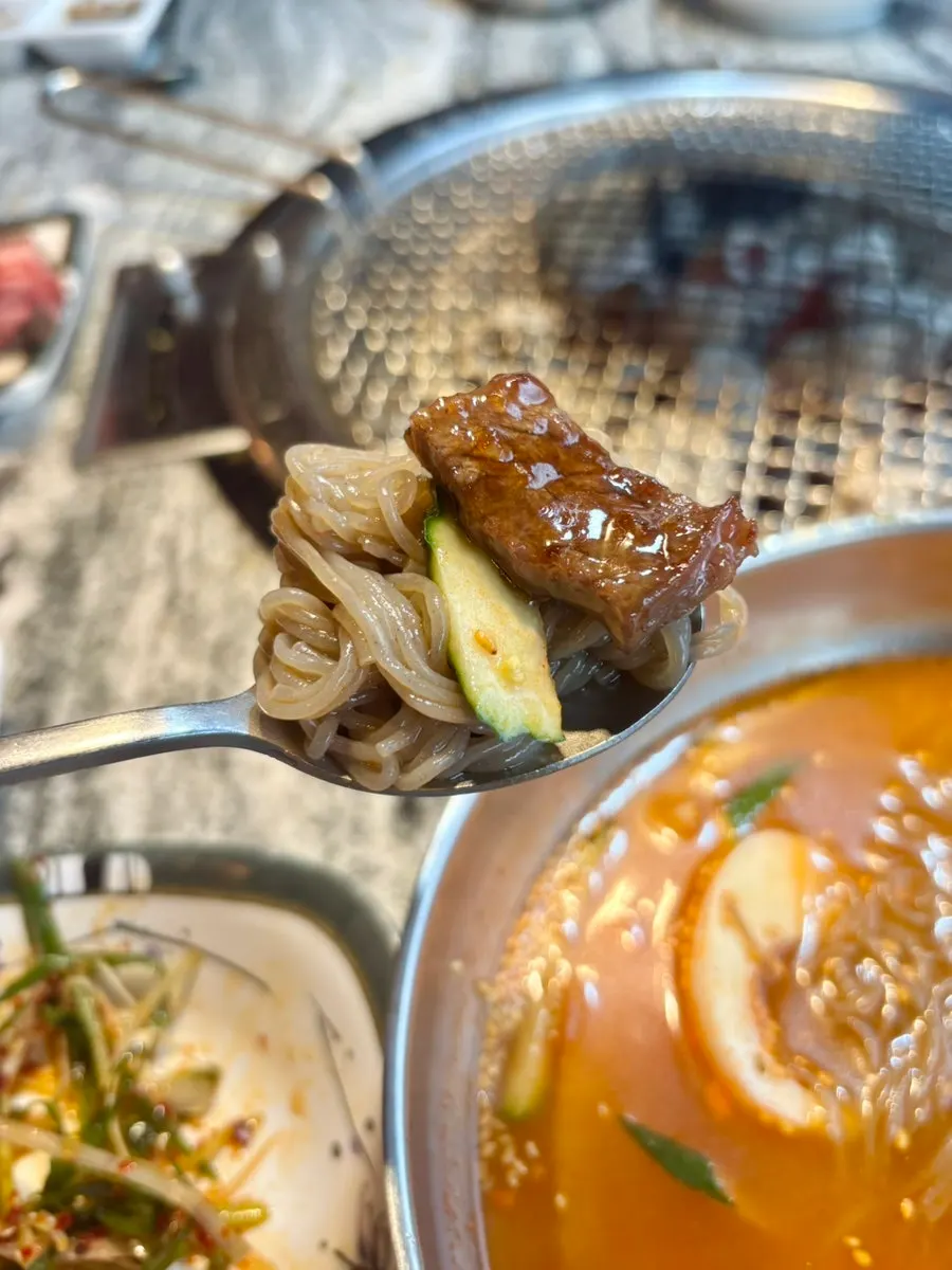 Mul naengmyeon enjoyed alongside galbi