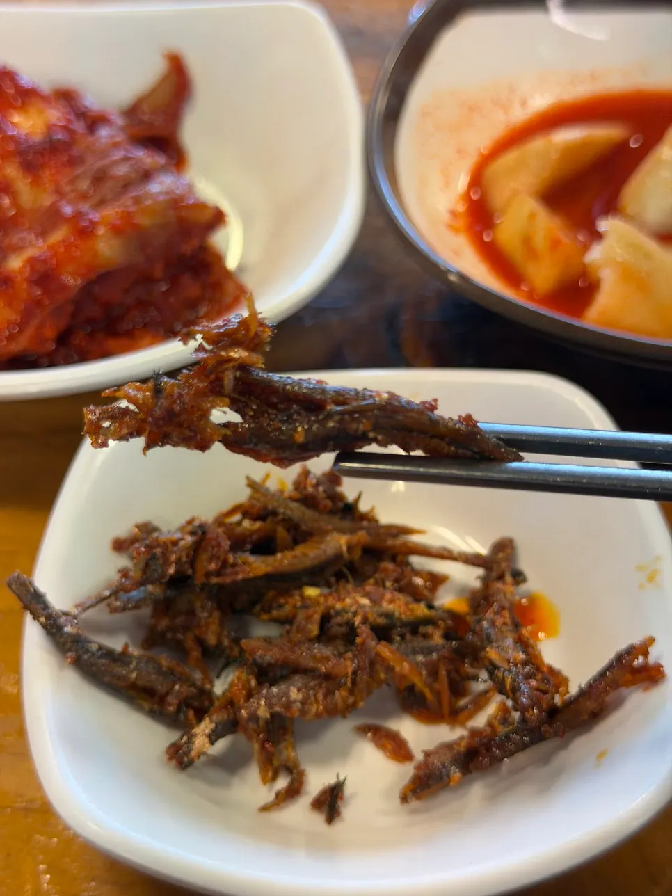 Self-serve banchan bar with onions, peppers, and ssamjang