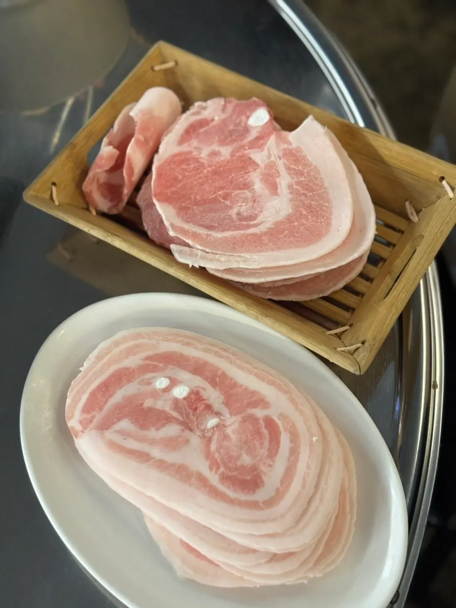 House-made green onion kimchi paired with quick-frozen pork