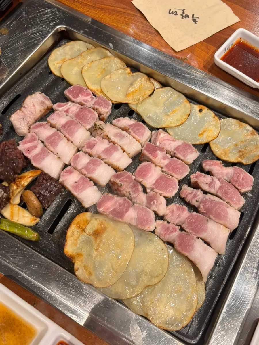 Pork belly grilled by the staff