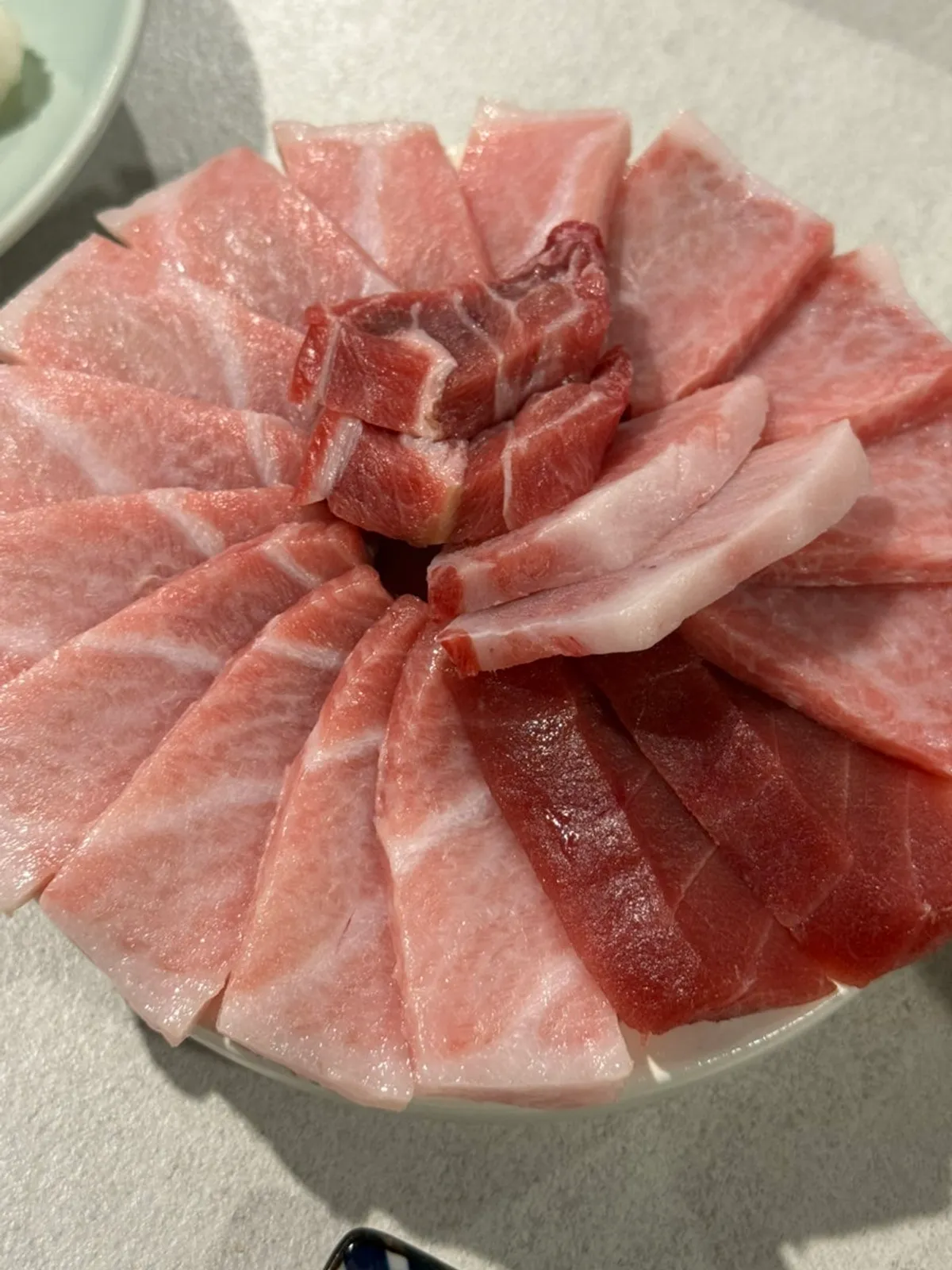 Chicken gomtang enjoyed warm before sashimi