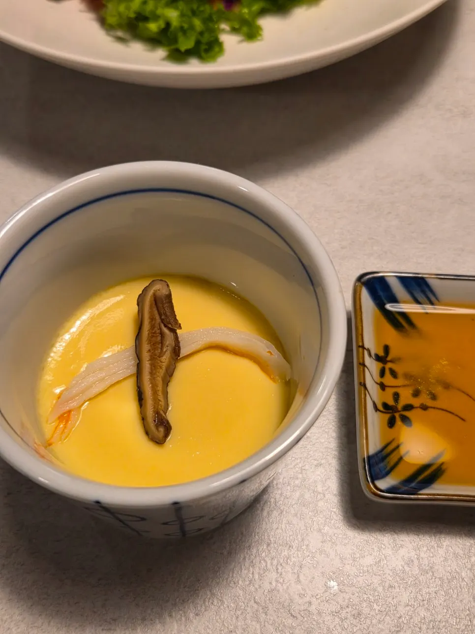 Steamed egg with shiitake mushrooms and crab meat