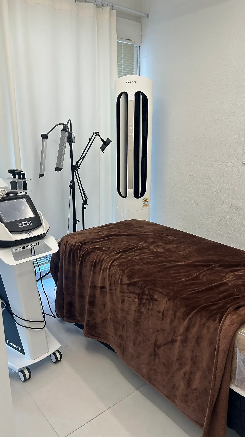Treatment bed inside the Fiora Beauty Shop treatment room