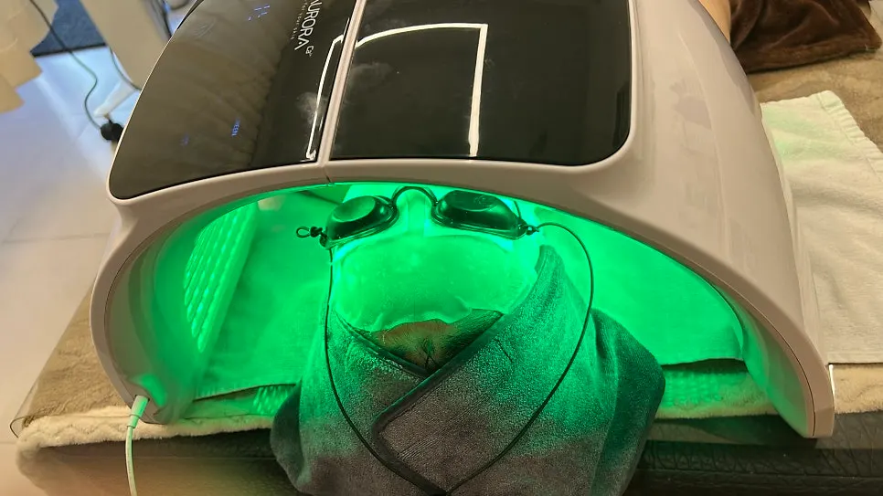 Final step with an LED device placed over the mask