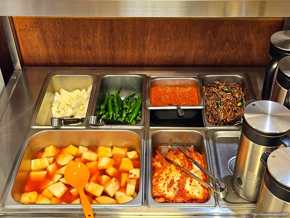 Self-serve kimchi, kkakdugi, and stir-fried anchovies