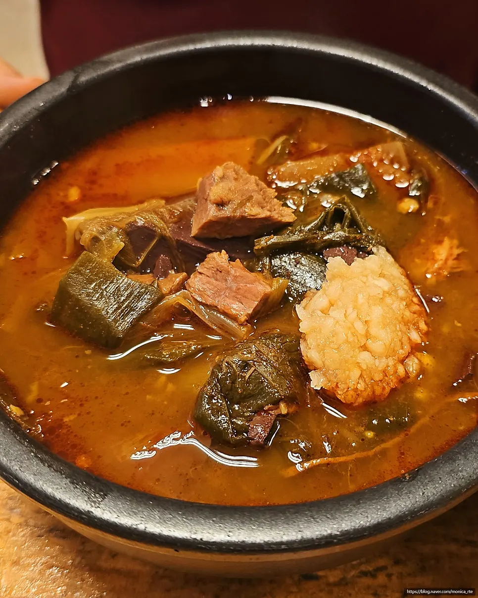 Vertical shot of gukbap at Hanwoojang