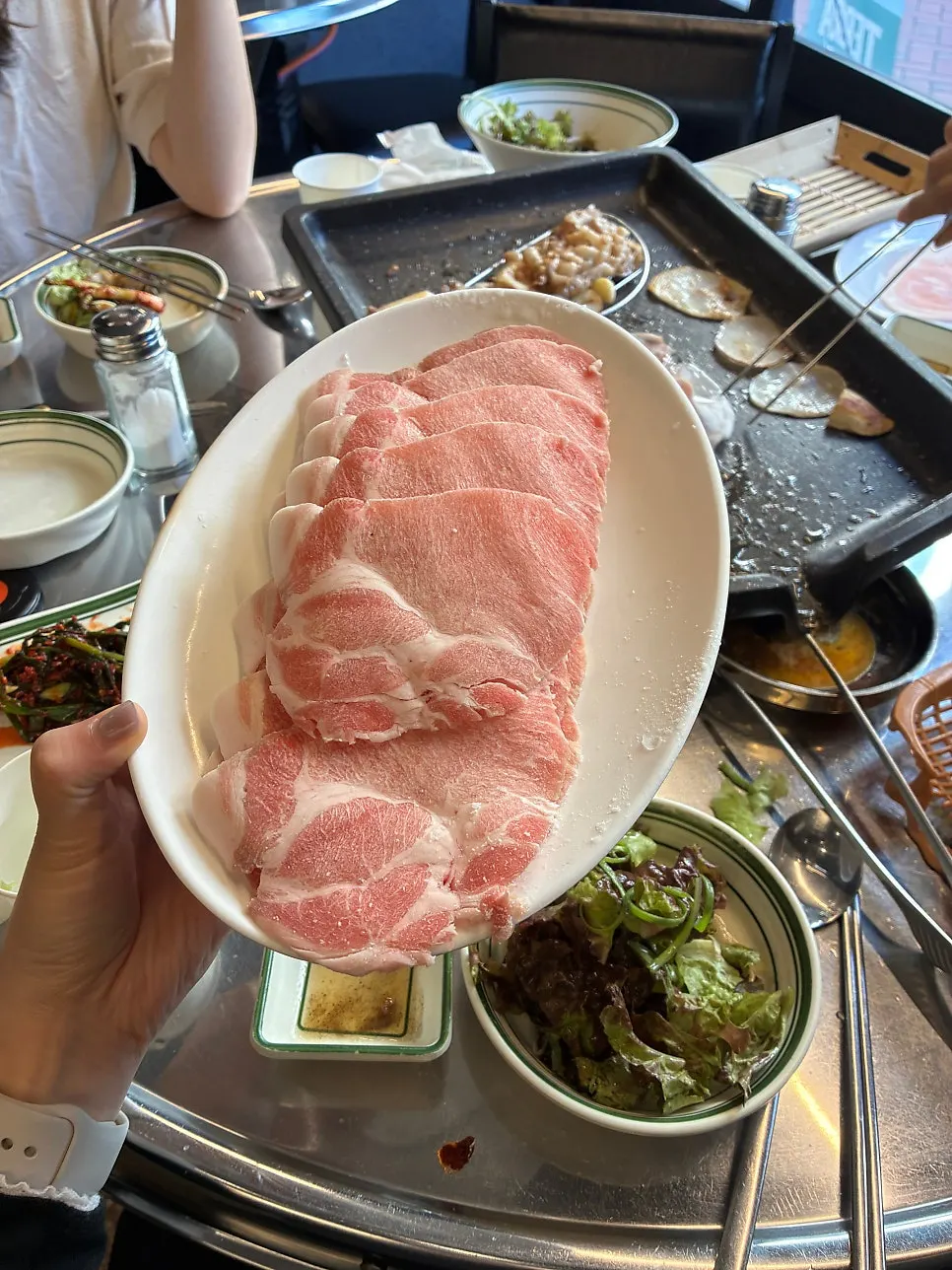 Plate of thick-cut frozen pork neck