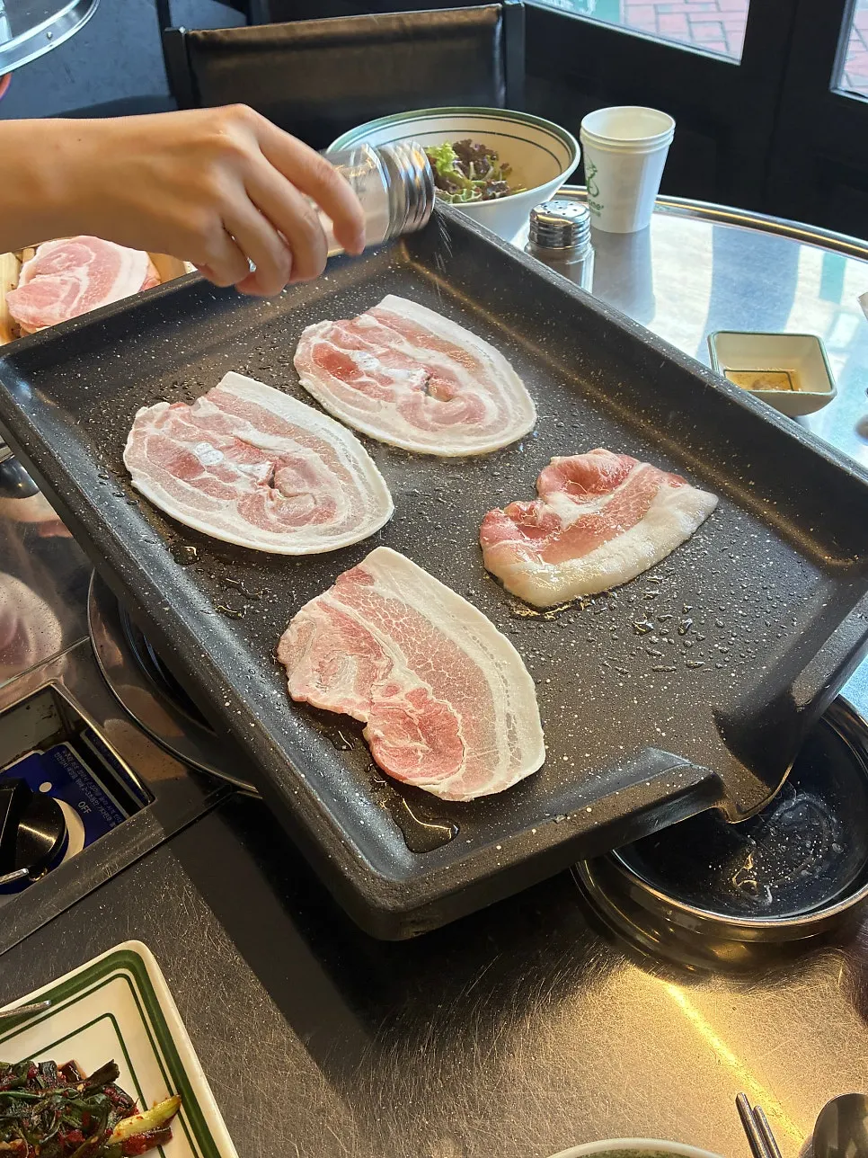 Perilla leaf wrap with meat, garlic, and ssamjang